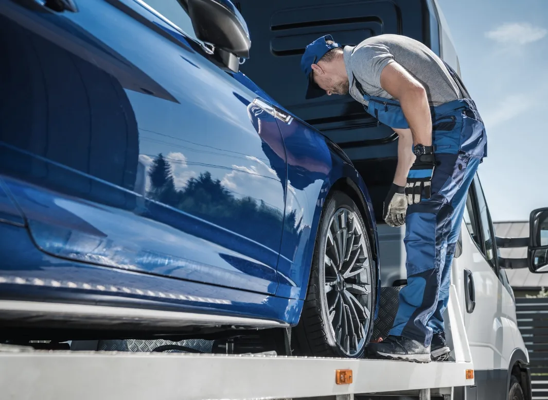 st. Louis local tow truck loading vehicle