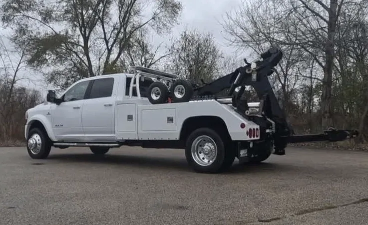 st. Louis wrecker equipment securing damaged vehicle