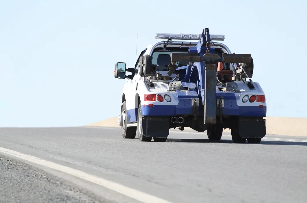 st. Louis wrecker tow truck on the roadside